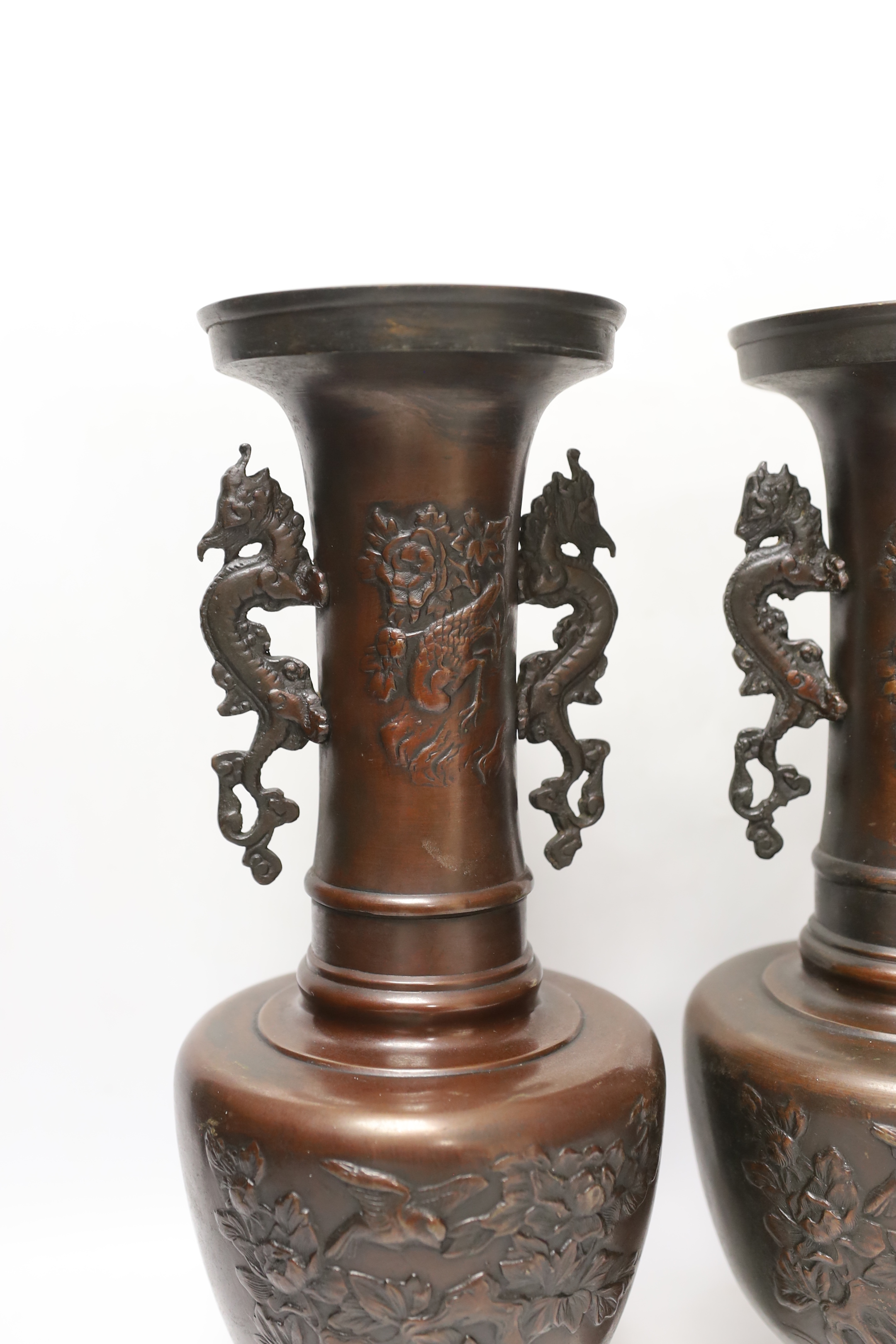 A pair of Japanese bronze vases, 38cm high